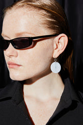 Ohrringe mit Muschelanhänger