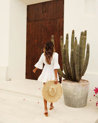 Yolanda – Gestuftes Babydoll-Kleid aus Baumwolle mit Ösen