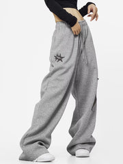 Graue Baggy-Jogginghose mit Stern-Patch