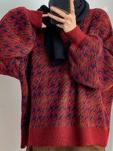 Hahnentritt-Strickpullover mit Karomuster