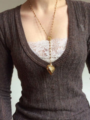 Vintage-Stricktop mit V-Ausschnitt und Zopfmuster