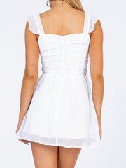 Minikleider mit gerüschten Schulterträgern