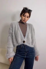 Strickjacken mit einem Knopf und offener Vorderseite