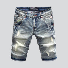 Elastische zerrissene Retro-Jeansshorts