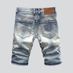 Elastische zerrissene Retro-Jeansshorts