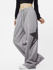 Graue Baggy-Jogginghose mit Stern-Patch