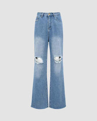 Sirius – Ausgestellte Jeans aus zerrissenem Denim