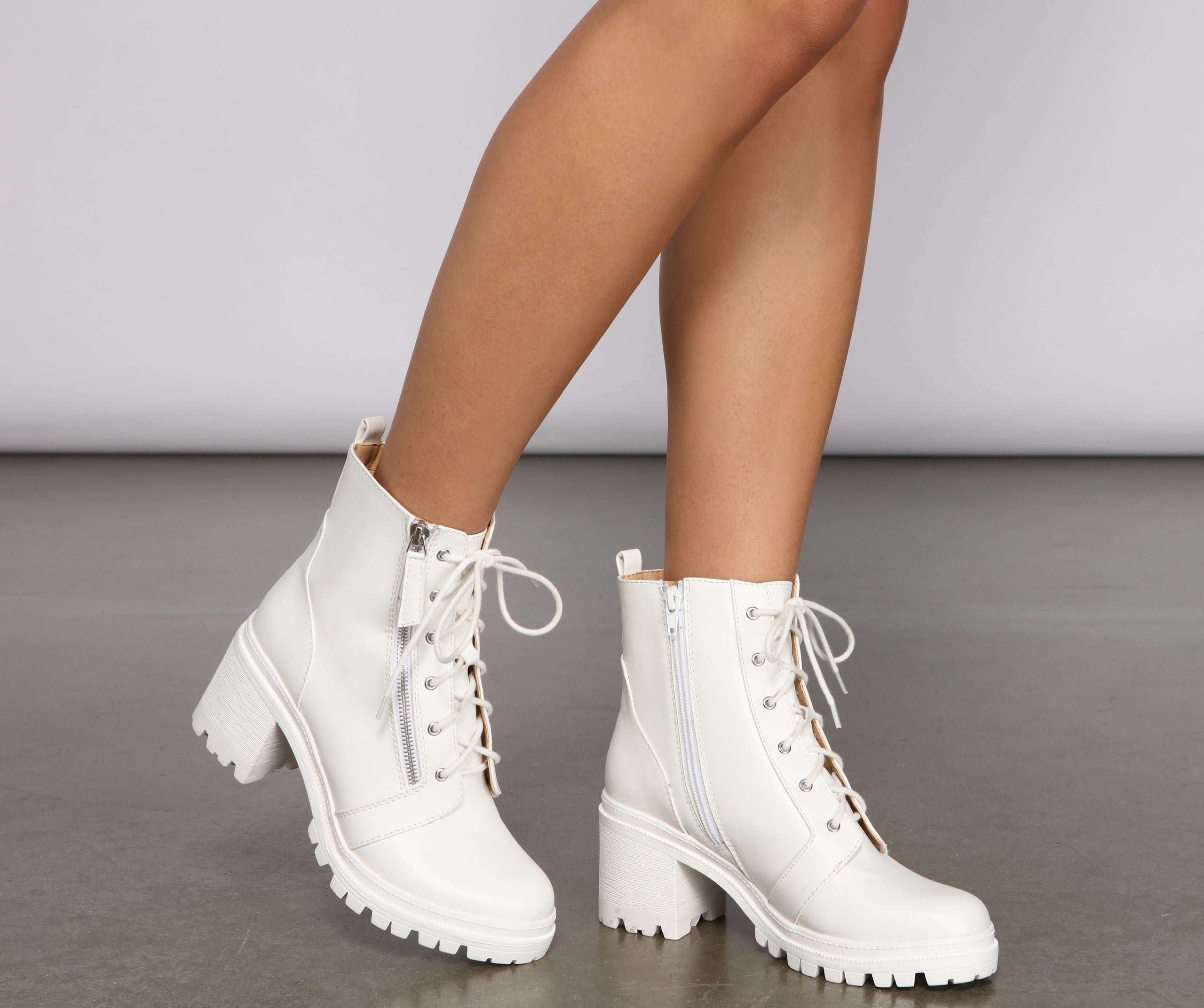 Edgy and Chic Faux Leather Lug Booties Newgew