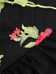 Partykleid aus Netzstoff mit Rosenstickerei