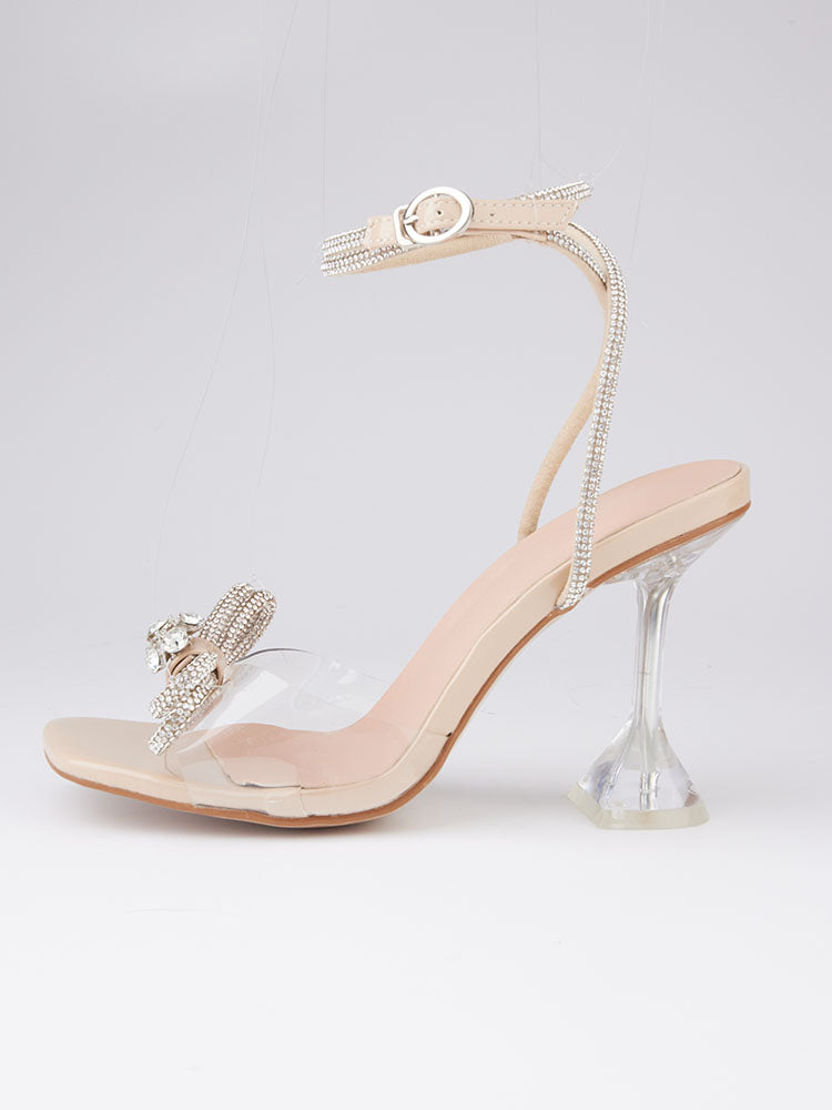Glitzernde High Heels mit eckiger Zehenpartie und Schleife