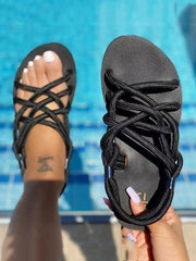 Flache Sandalen mit überkreuztem Seil