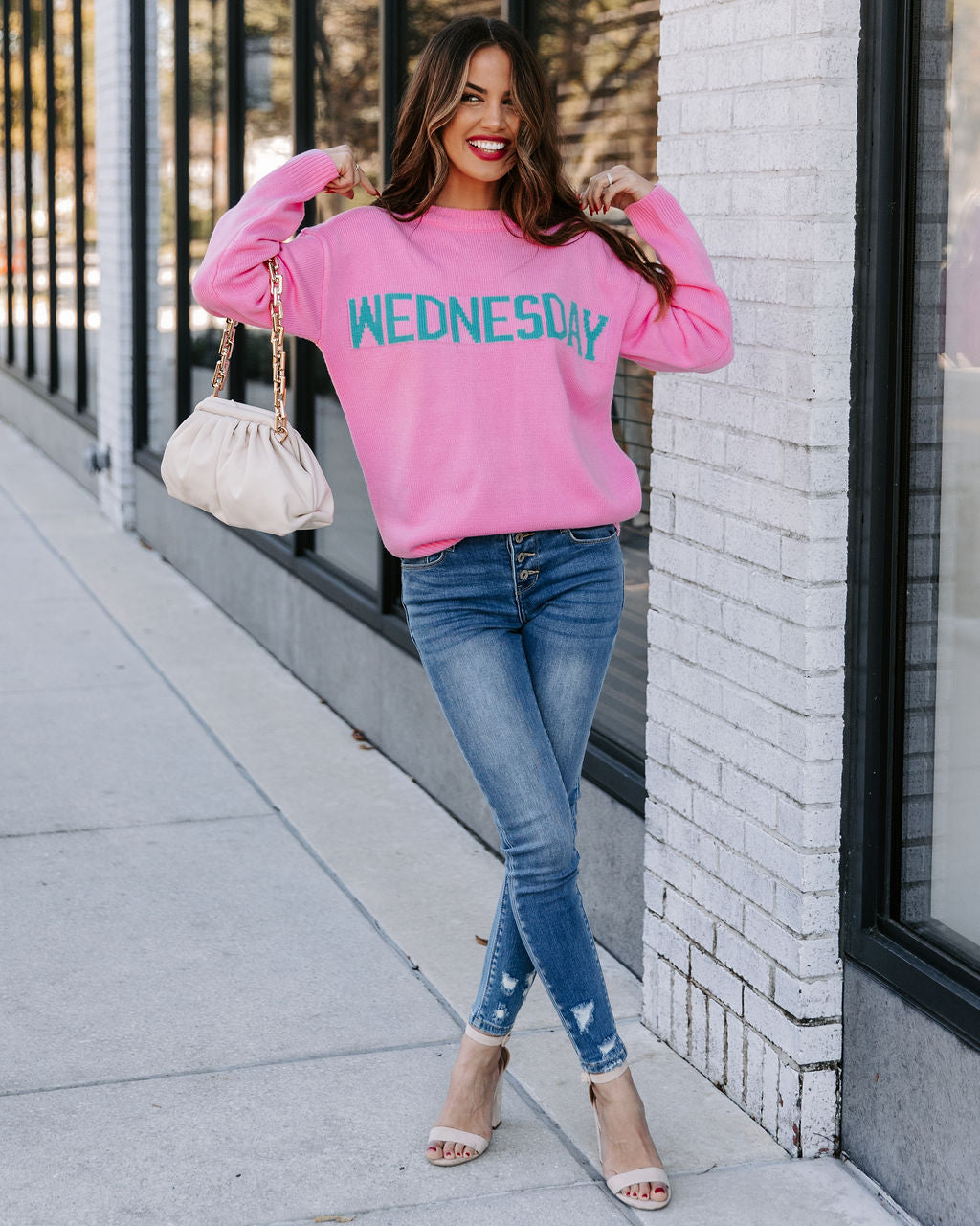 Wednesday Wearing Pink Knit Sweater