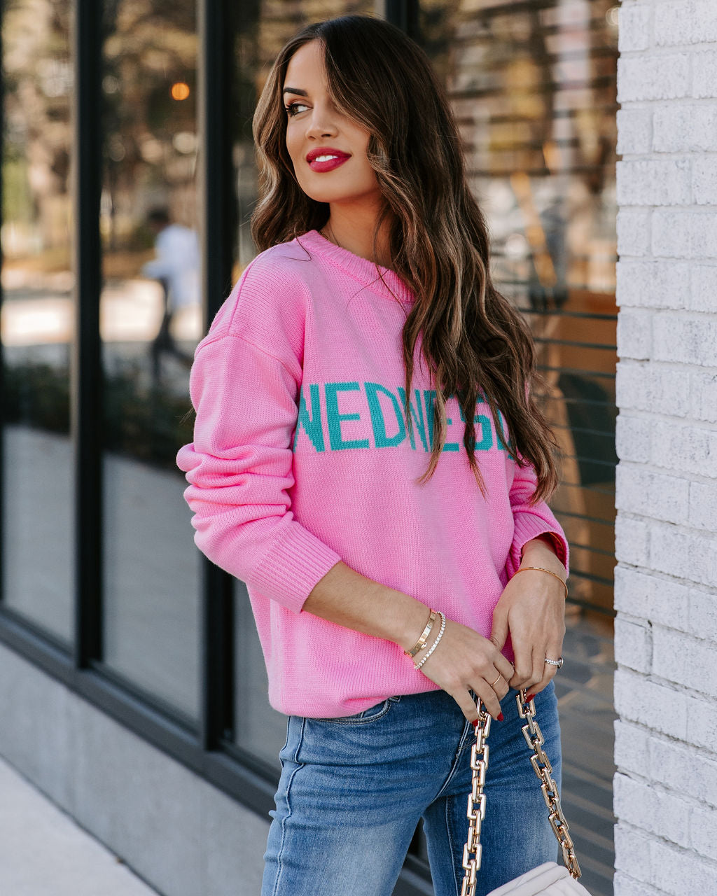 Wednesday Wearing Pink Knit Sweater