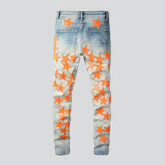 Orangefarbene Jeans mit Sternenstickerei für Herren