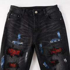Schwarze Jeans mit Farbspritzer-Print