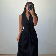 Weißes zweiteiliges Set aus Oberteil und Rock mit Blumenapplikationen