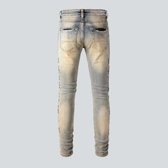 Leather bones embroidery men jeans