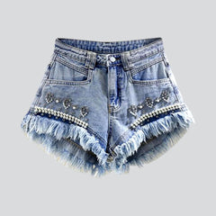 Distressed hem pearl denim shorts