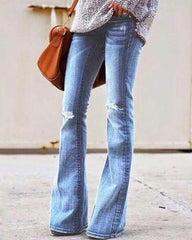Vintage Schlagjeans mit hoher Taille und Used-Look im Kniebereich
