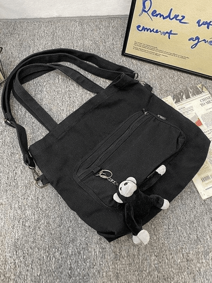 Vintage-Umhängetasche mit Cartoon-Anhänger