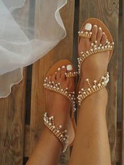 Flache Sandalen mit Perlen-Bling