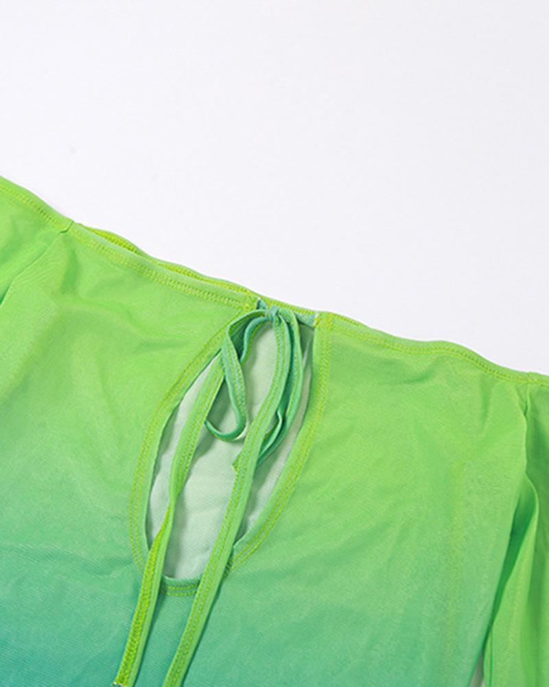 Oinoie – Minikleid aus Netzstoff mit Cut-outs 